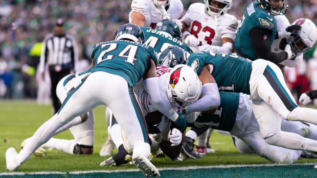 Dec 31, 2023; Philadelphia, Pennsylvania, USA; Arizona Cardinals running back James Conner (6) runs for a touchdown against the Philadelphia Eagles during the fourth quarter at Lincoln Financial Field.
